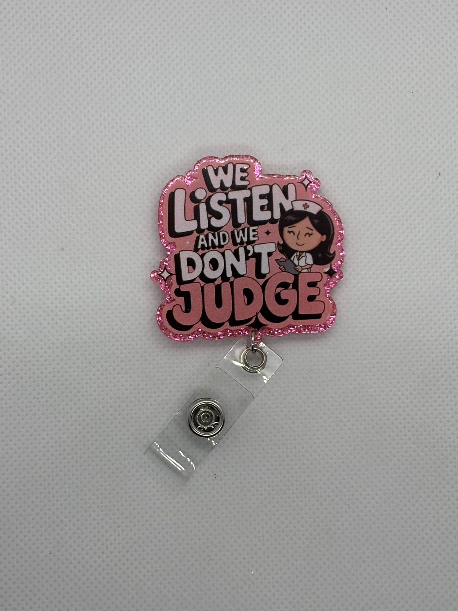 Pink “Listen and Don’t Judge” Badge Face
