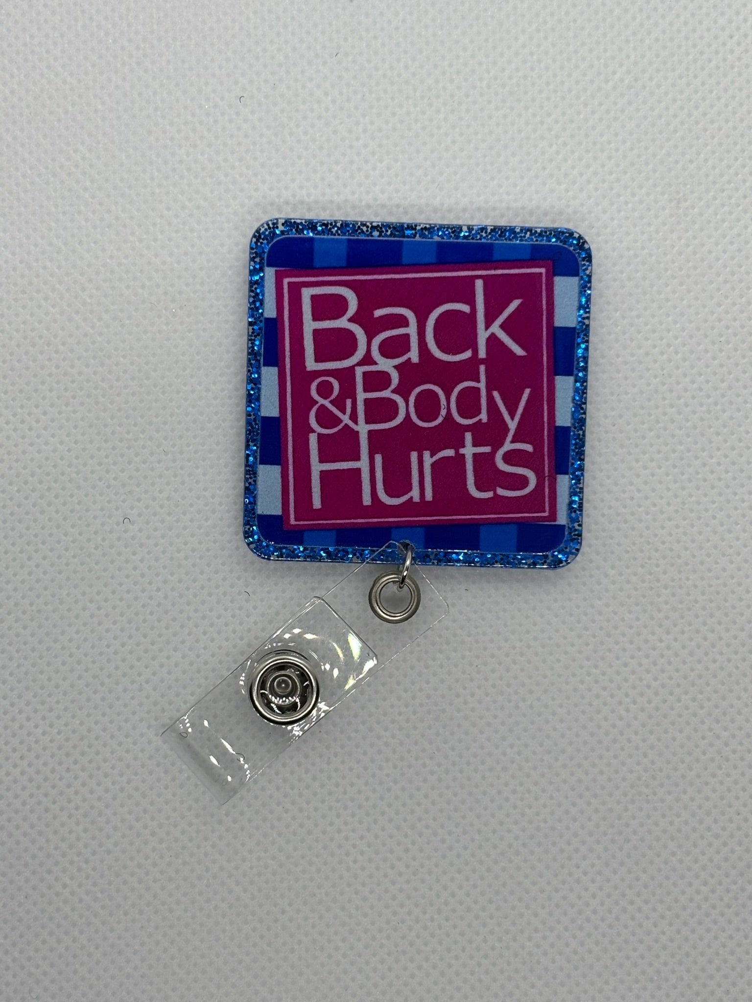 “Back & Body Hurts” Badge Face