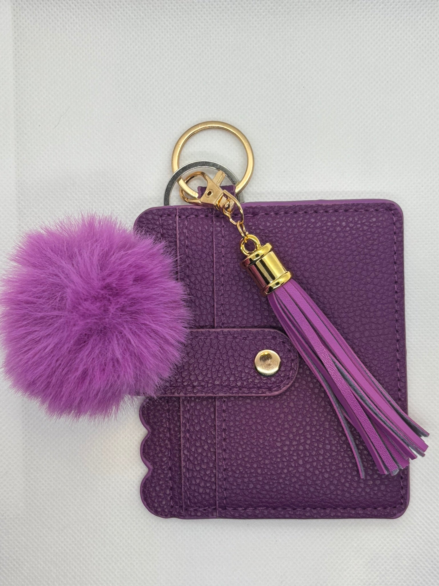 PURPLE WALLET WITH POMPOM