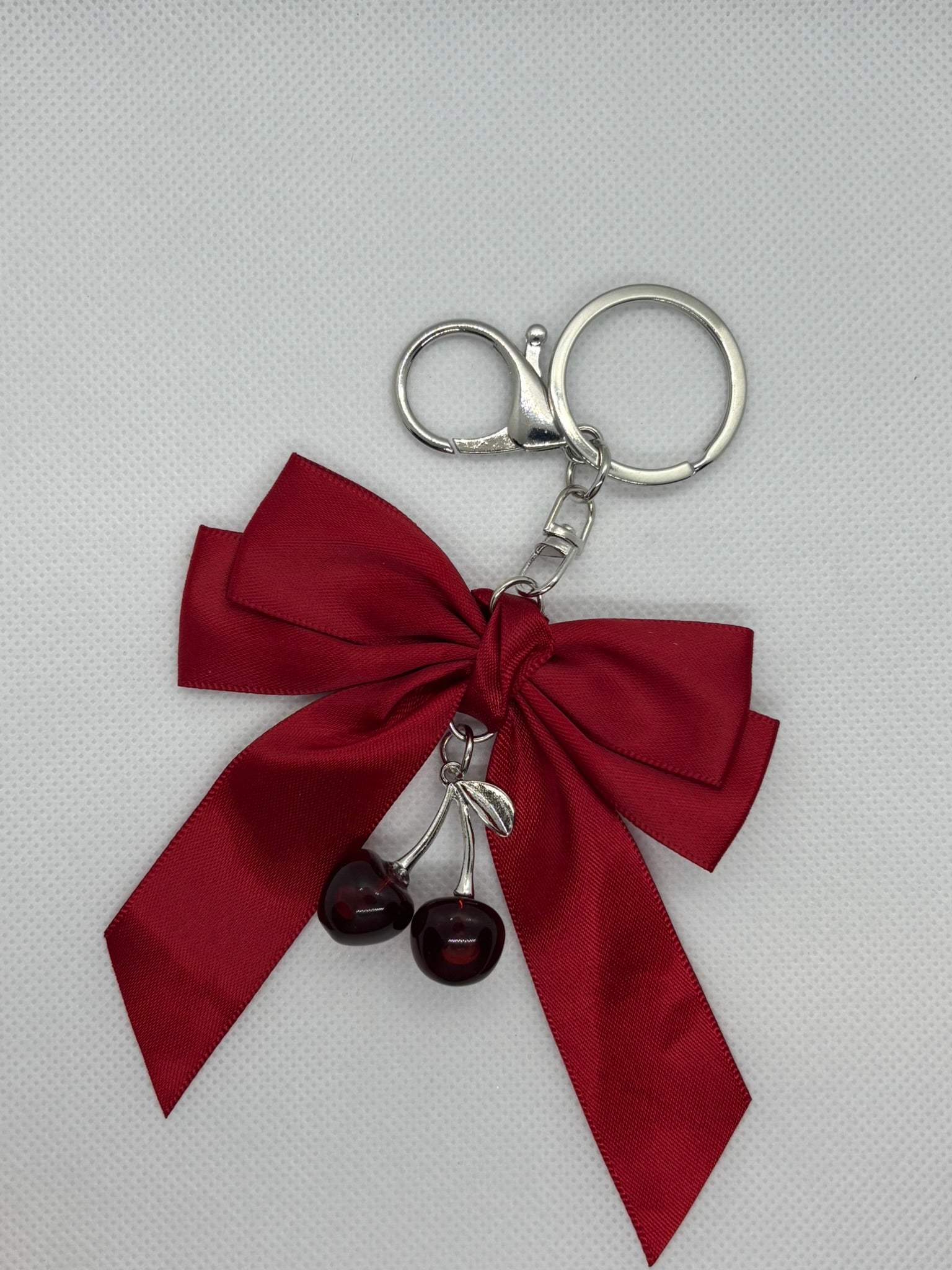 RED BOW AND CHERRY KEYCHAIN
