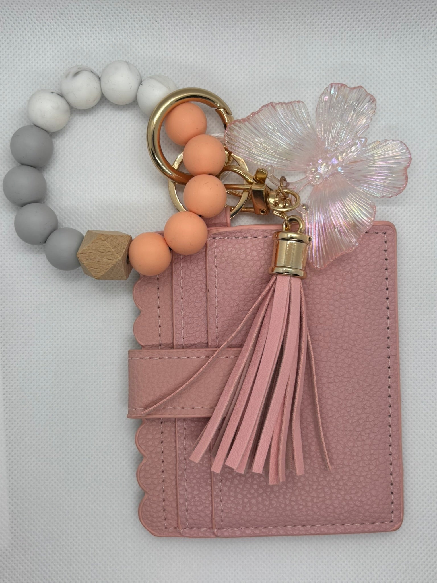 PINK WALLET WITH WRISTKET AND BUTTERFLY KEYCHAIN